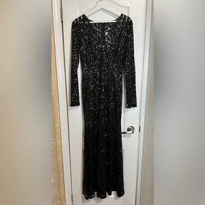 Black dress. Size 4 US - 6 US. Brand new with tags.